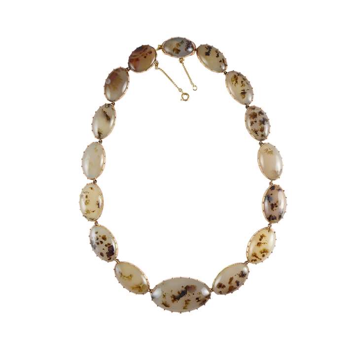 Graduated moss agate and gold collet necklace, the cabochon cut stones of oval-navette shape
